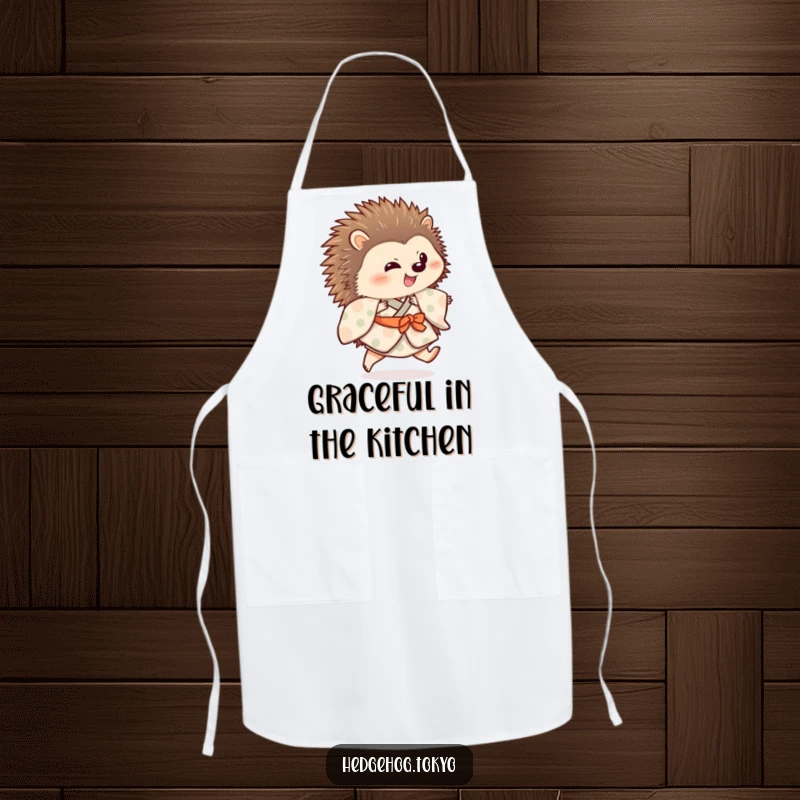 Funny hedgehog wearing a patterned kimono is shown on an apron, doing a playful hop, adding cute humor to kitchen tasks.