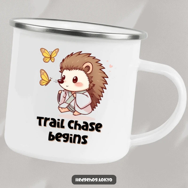 Funny Hedgehog Camping Mug: A playful hedgehog in a loose kimono joyfully chases a butterfly, perfect for outdoor fun and humor.