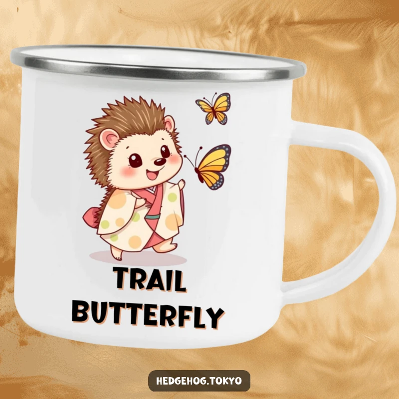 Funny Camping Mug: A cute hedgehog in a kimono chases a butterfly, bringing playful energy and humor to your outdoor beverage experience.
