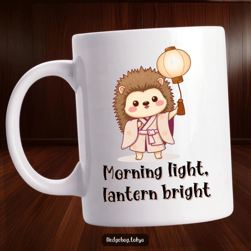 Funny mug featuring a proud hedgehog wearing a kimono and holding a glowing paper lantern, radiating gentle humor and charm.