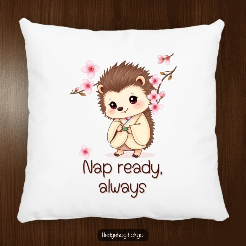 Funny pillow featuring a charming hedgehog in a kimono, peeking from behind a delicate cherry blossom, offering comfort and humor.