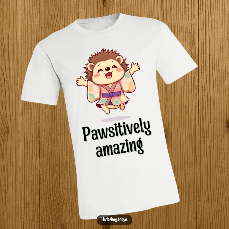 Funny hedgehog t-shirt showing a cheerful hedgehog in a vibrant kimono, caught mid-leap with paws outstretched, embodying pure, energetic joy.